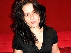Mature slut masturbating on the couch