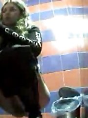 HQ spy cam films three babes peeing in public loo