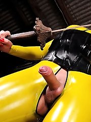 Sultry shemale in yellow latex