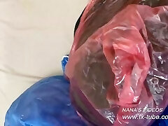 Latex-clad ladies plastic rainwear chain orgasms