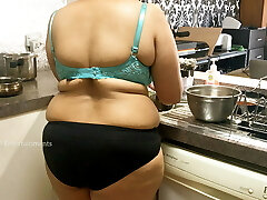 Massive boobs Bhabhi in the Kitchen wearing panties and bra