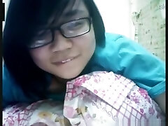 Nerdy asian chick has cybersex with her bf on skype