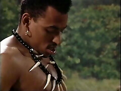 Two african males with donkey cocks fuck brown-haired