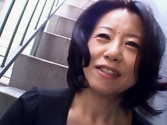Horny Japanese granny Junko Sakashita spreads her gams to be dicked