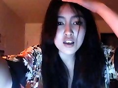 asian displaying off her body on webcam
