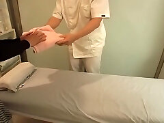 Skinny Japanese broad fucked in spy cam massage video