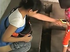 Chinese damsels in an old public toilet