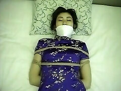 Japanese dress woman tied up and gagged