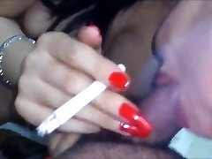 indonesian babe giving oral pleasure while smoking