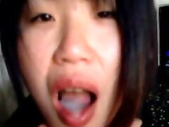 Asian babe jerking and blowing