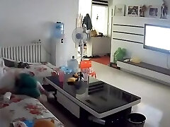 Chinese couple living room sex flick