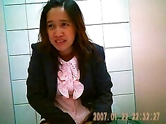 Covert cam in thai office toilet