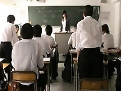 Huge-titted Japanese teacher gets treated like a slut by a gang o
