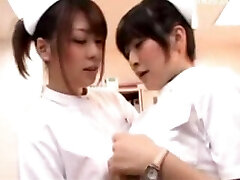 Young Nurse Kneading Her Pussy With Pen Her Colleauge Joins Her Smooching Rubbing Tits