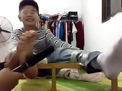 Chinese boy tickle