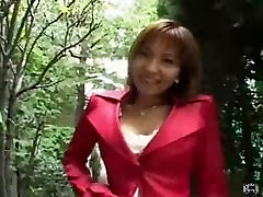 Japanese Milf uses a remote control magic wand in public and blows