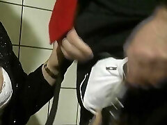 An elderly German lady gets her mouth covered in the bathroom