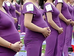 Preggo Asian women doing yoga (non porn)