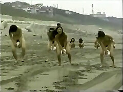 japanese nude ladies ball playnig on the beach