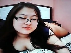 Cute chubby asian teen on webcam