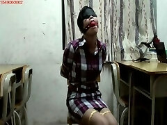 Chinese rope tied and ballgagged
