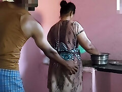 Aunty was working in the kitchen when I had intercourse with her