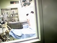 Chinese physician and his nurse fuck in the medical department
