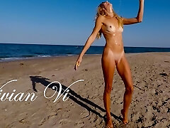 Naked Workout on the beach - a beautiful skinny milf with puny tits