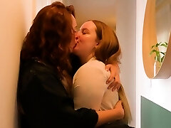 Curly redhead dumps during lesbian finger fucking