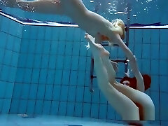 Milana And Katrin De-robe Eachother Underwater