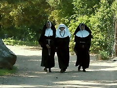 Sinful red haired nun Penny Pax is so into licking moist pussy outdoors