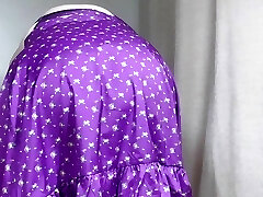 Mature Sally in short lilac skirt, showing off her bod