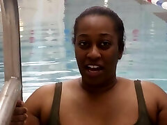 BBW Black girl put a pink latex swimcap