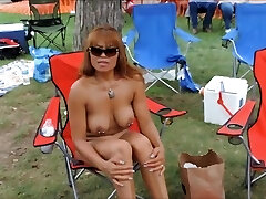 Pierced mature nudists display everything off at the resort Pierced mature nudists display everything off at the resort