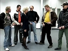 Mature platinum-blonde in stockings is penetrated in all holes