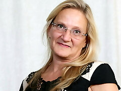 American cougar Mary Wana strips off and plays at the office American cougar Mary Wana strips off and plays at the office