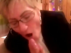 Office granny in business suit sucking me