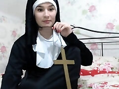 Cool chick is dressed as a nun and teases to flash a little 