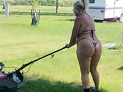 Got back to find wife mowing in a thong bikini, her arse and thighs wiggling with every step 
