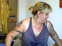 Maid straddles mature wife