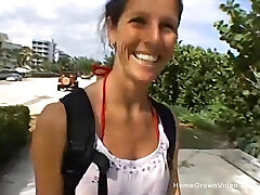 Adorable and busty brunette strokes off a man she met at the beach until he spews