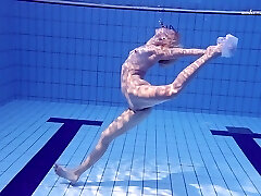 Splendid Elena Proklova once again gets totally bare in the pool
