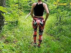 Public masturbation, a female in leggings walks in nature