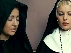 Charlotte Stokely is a horny nun who wants to be enticed by a female