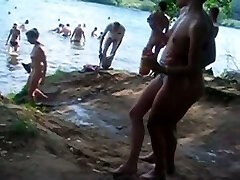 Hidden cam vid taken while strolling through a nudist beach