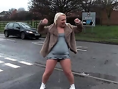 Chubby ash-blonde pissing outdoors