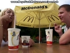 Mature leans over for doggy fuck in public Mature leans over for doggy fuck in public