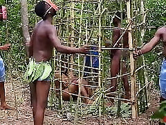 Somewhere in west Africa, on our annual jamboree, the king drills the most wonderful maiden in the cage while his Queen and the guards are seeing