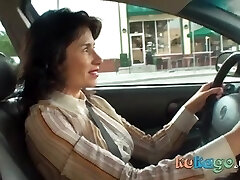 Insane brunette woman in the car Insane brunette woman in the car