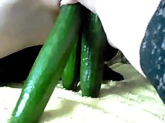 Extreme amateur fucks a whiskey bottle and cucumbers